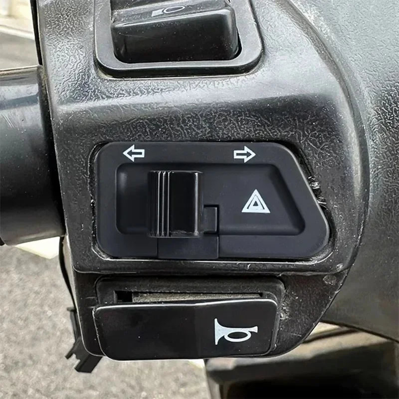 Dual-function motorcycle warning light switch for turn signals and emergency flashing