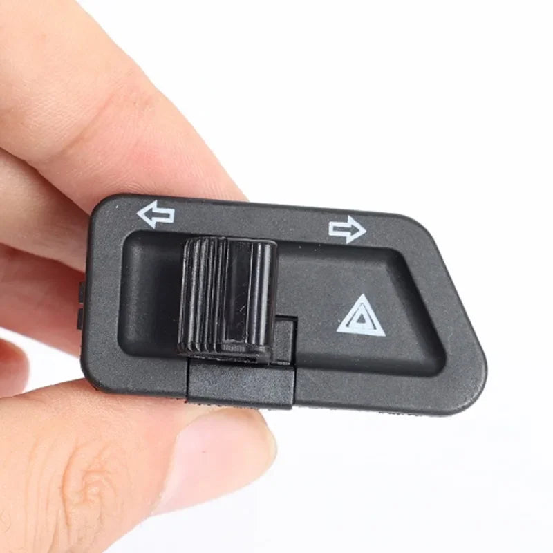 Dual-function motorcycle warning light switch for turn signals and emergency flashing