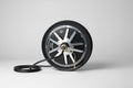 Close-up of a bicycle wheel hub with visible branding on a neutral background