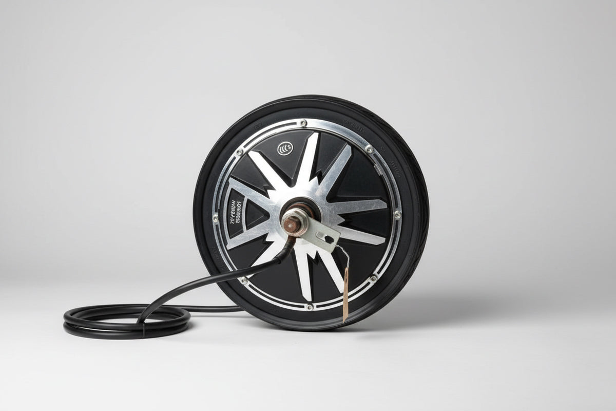 Close-up of a bicycle wheel hub with visible branding on a neutral background